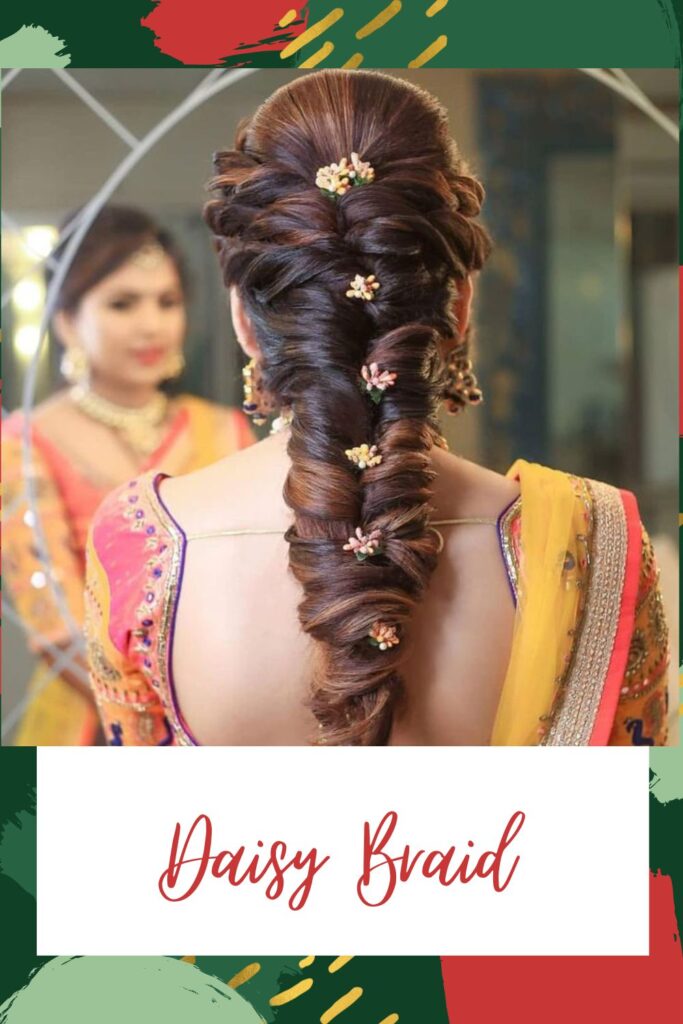 A girl in yellow and pink lehenga with deep neck blouse showing the back view of her daisy braid - Hairstyles for Indian Women
