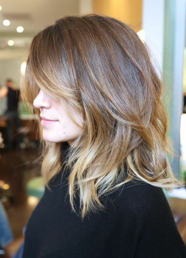 Girl in black full sleeves top and Wavy Ombre Mid-length Haircut - cute hairstyles for medium hair easy