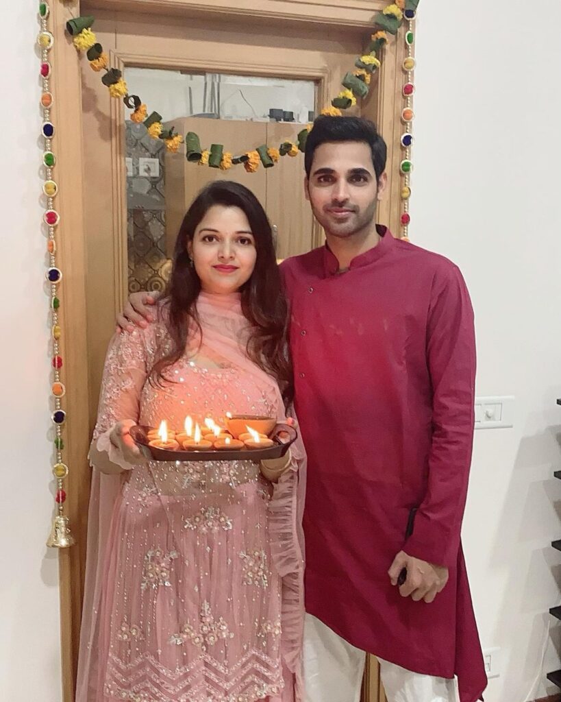 Bhuvneshwar Kumar and Nupur Nagar in traditional outfit - indian cricketers wife