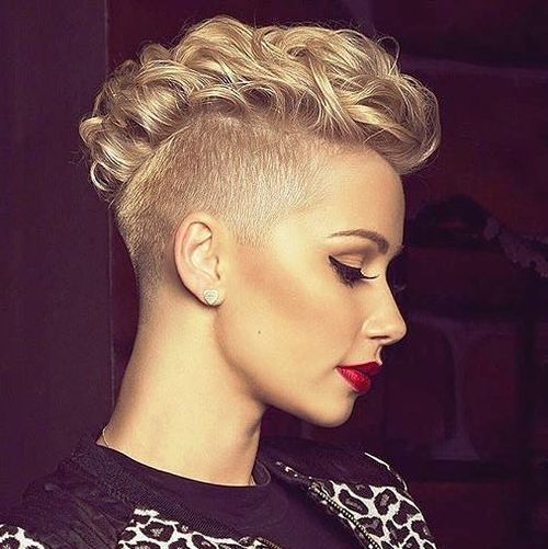 Woman in black and white dress with red lipstick and mohawk hairstyle - women hairstyle 2022