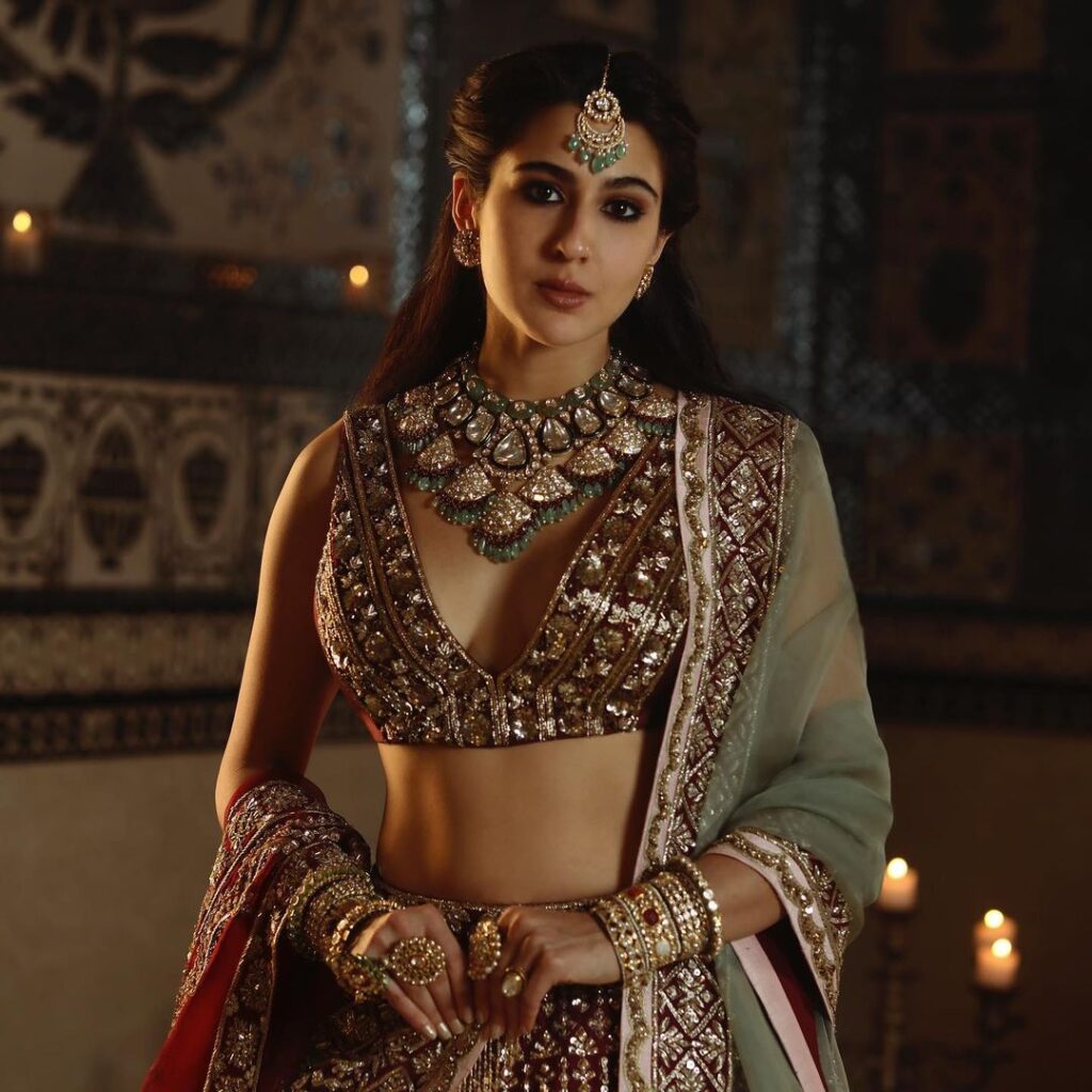 Sara Ali Khan in maroon lehenga and heavy necklace - bollywood actresses hairstyles 2022
