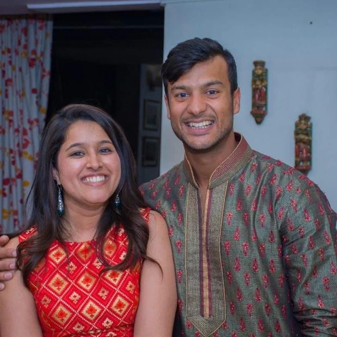 Smiling Mayank Agarwal and Aashita Sood posing for camera - indian cricketers wife