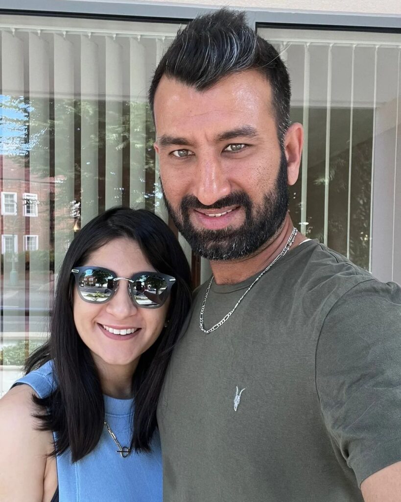 Cheteshwar Pujara and Puja Pabari posing for a selfie - indian cricketers and their wives