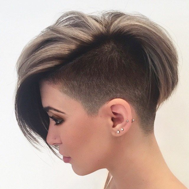 Girl showing the side view of her Shaved short haircut - long haircut 2022