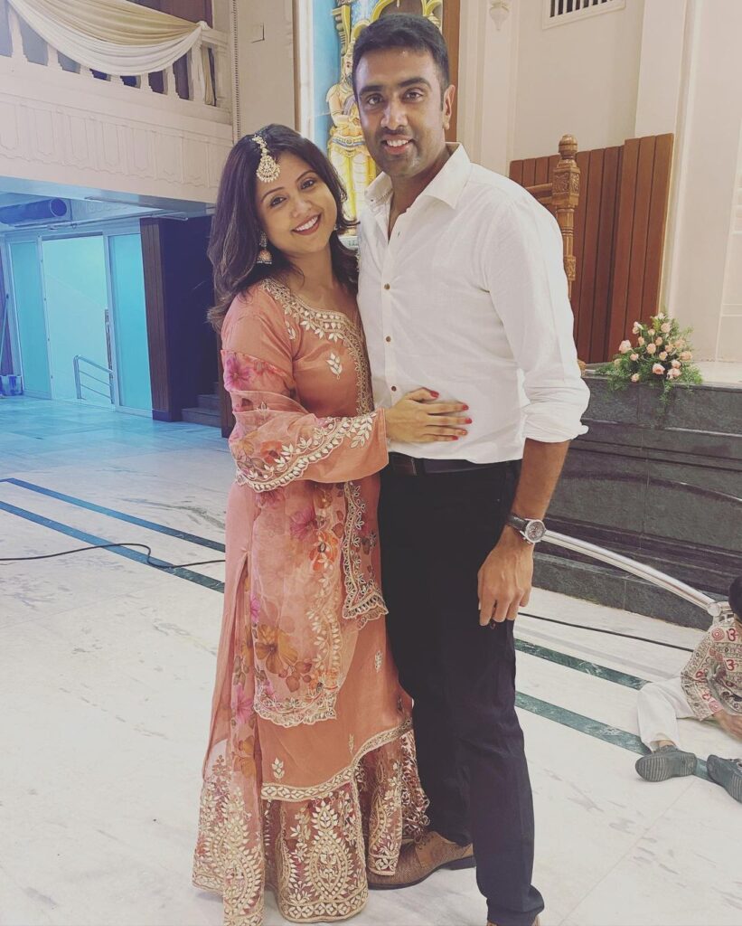 Ravichandran Ashwin and Prithi Ashwin in traditional outfit posing for camera - indian cricketers wives and girlfriends