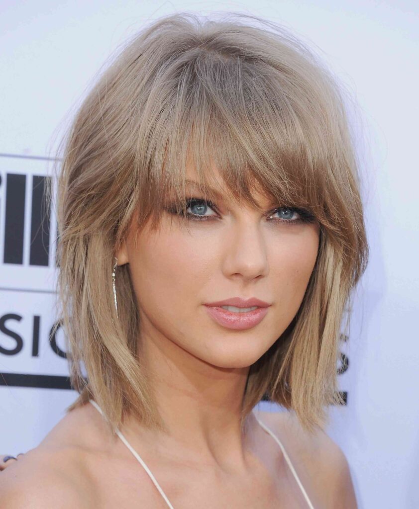 A women in white strappy dress showing her Short layered Haircut - best professional hairstyles