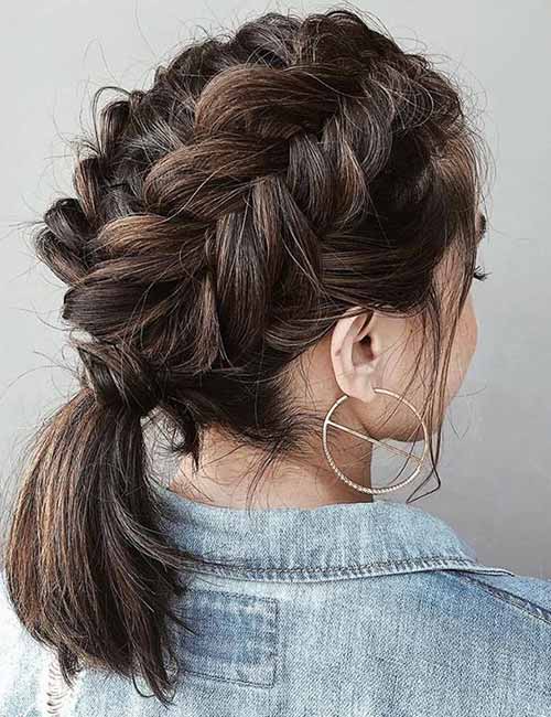 A girl in blue denim jacket and hoops earrings showing the back view of her Double Dutch Braid - haircut styles women