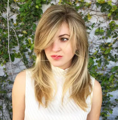 A girl in white cut sleeves top and pink lipstick showing her Straight Balayage hairstyle - female hairstyles