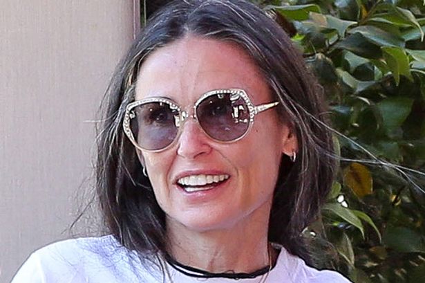 Demi Moore in white top with sun glasses in no makeup look - celebrities without makeup 2022