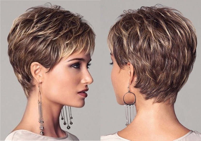 A girl in round neck top and long earring showing her Layered Pixie Haircut - professional hairstyles for women