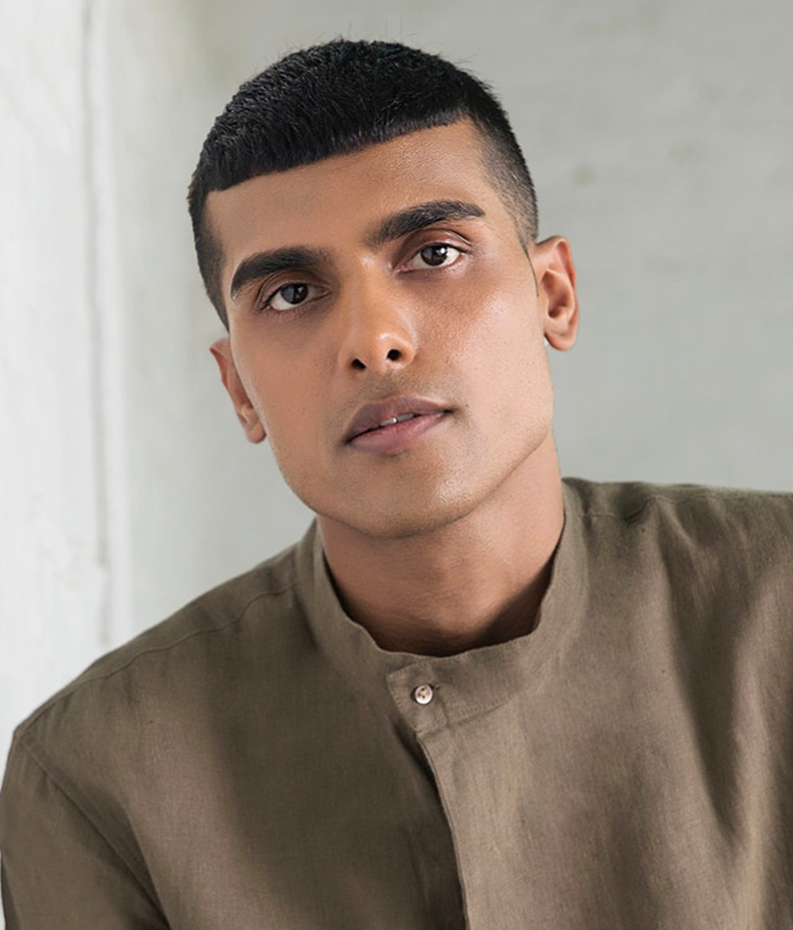 Man in brown high neck kurta and Buzz Hair Cut - best haircut for Indian boy