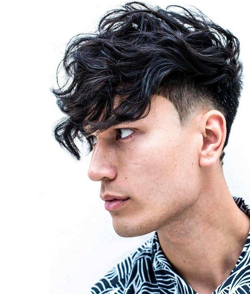 Man in black and white printed shirt and Messy Fringes Haircut - Decent hairstyle for Indian boy