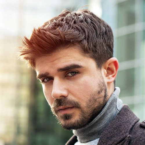 man in grey high neck sweater with Taper Haircut - haircuts for men with beards