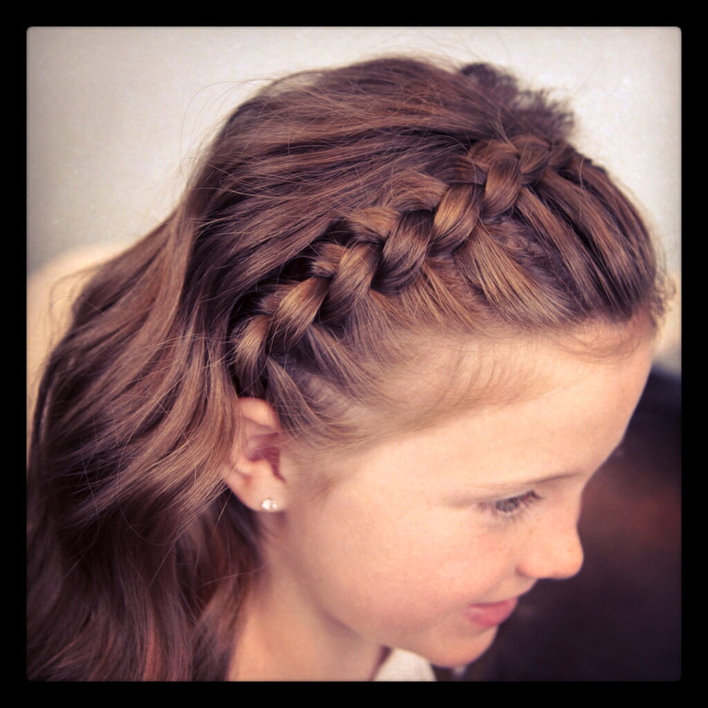 A girl showing the side view of her Braid Headband hairstyle - latest women hairstyle