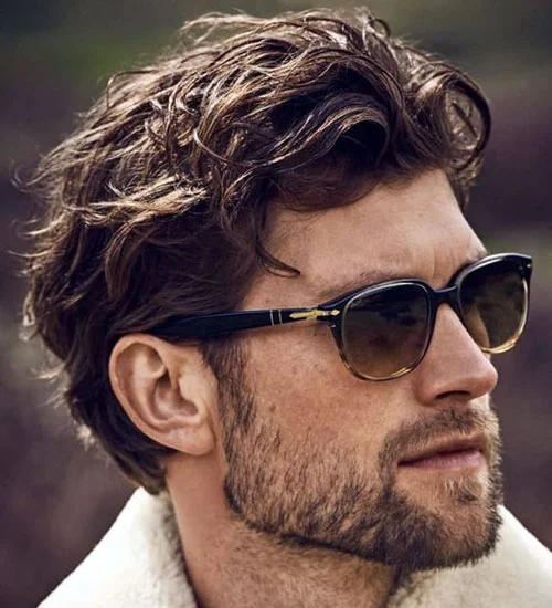 Man in white fur coat with goggles and Wavy Hairstyles - mens haircuts list