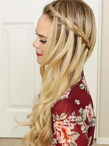 Woman in red floral dress and Waterfall Braids hairstyle  - simple hairstyles for women