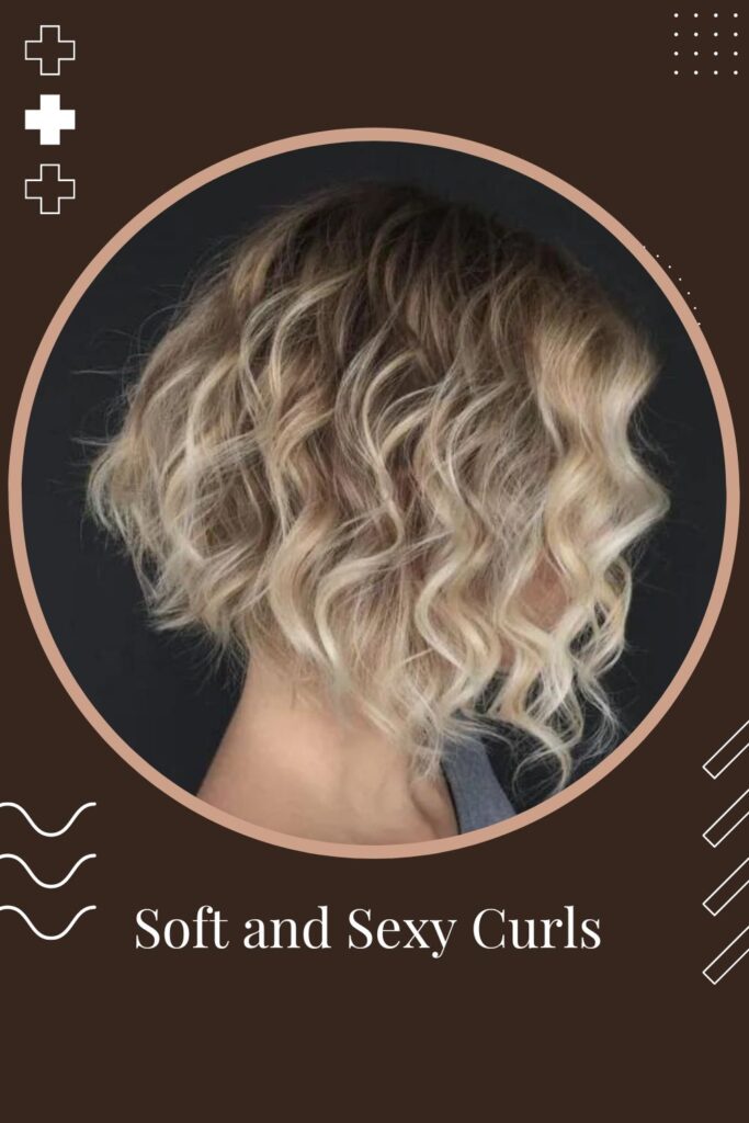 Woman in grey top showing the side view of her Soft and Sexy Curls hairstyle - Short naturally curly haircuts