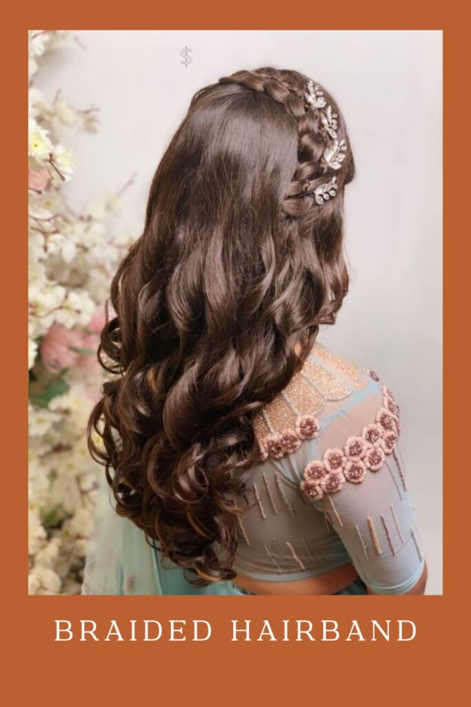 Woman in sky blue and pink dress with Braided Hairband hairstyle - simple hairstyle for lehenga
