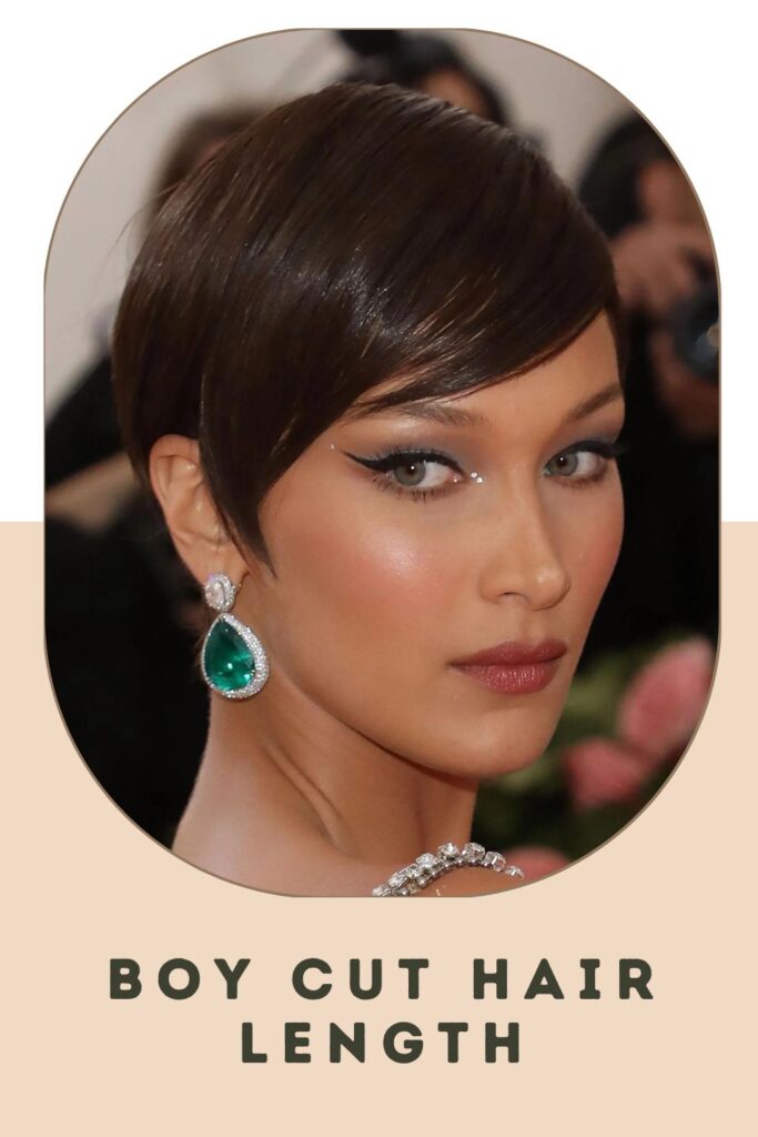 Woman in green drop earrings and  Boy Cut Hair Length hairstyle - short hairstyles for women 2022