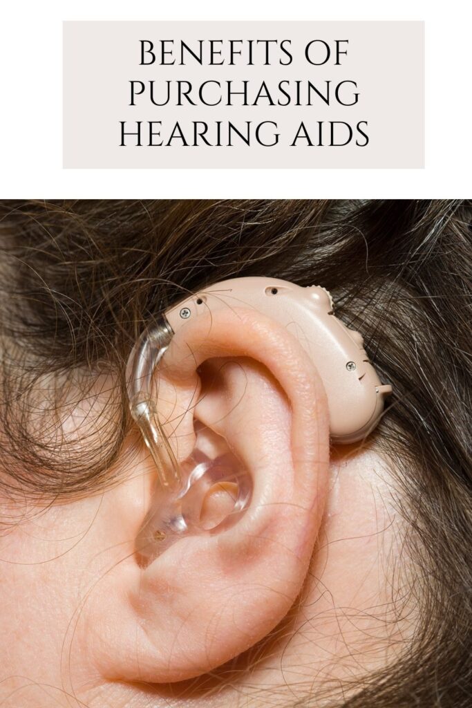 A woman is showing her hearing aid - Hearing Aids