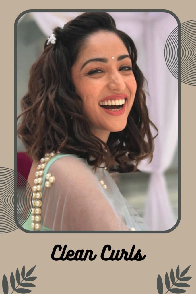 Smiling woman in sky blue lehenga and Clean curls Smiling woman in sky blue lehenga and Clean curls - best Indian bridal hairstyles for short hair