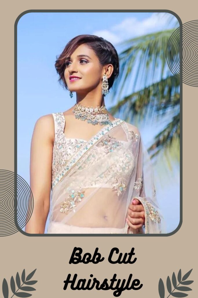 Woman in multi color net saree with Bob cut hairstyle Woman in multi color net saree with Bob cut hairstyle - Indian bridal hairstyles for saree